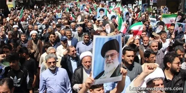 Iran vows to strike back if US attacks as regime change protests continue