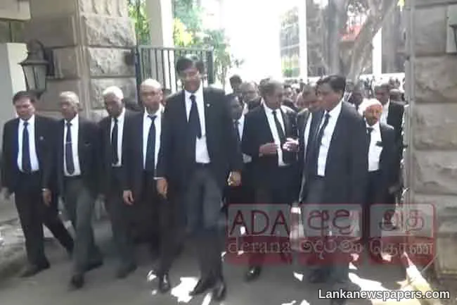 Lawyers stage protest march over killing of lawyer and wife in Akuregoda