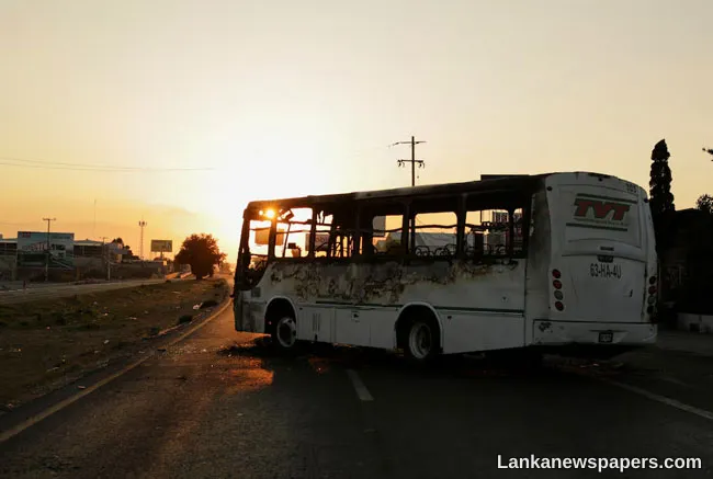 Mexican drug lord killing sparks revenge attacks; cars and businesses set ablaze, highways blocked