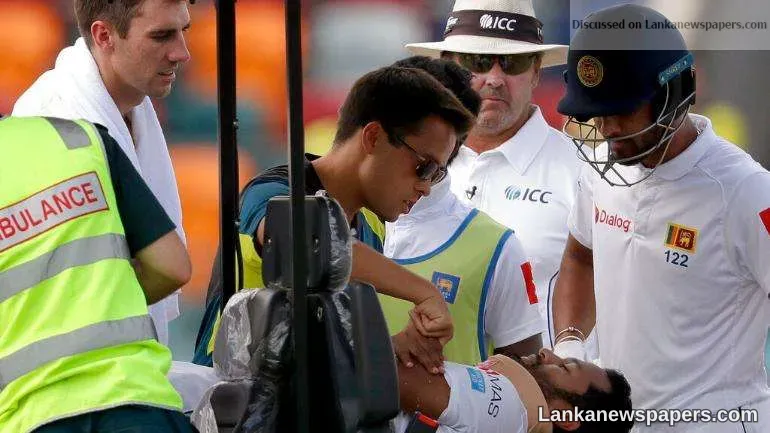 Dimuth hit by bouncer and stretchered off