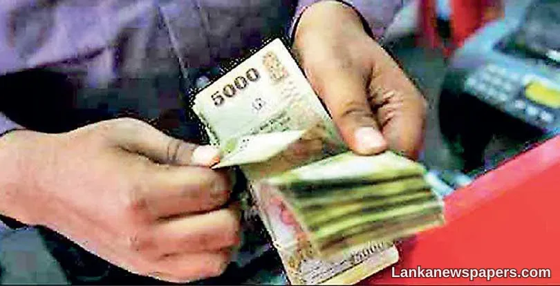 Rupee ends at its lowest in over 7 months; stocks fall