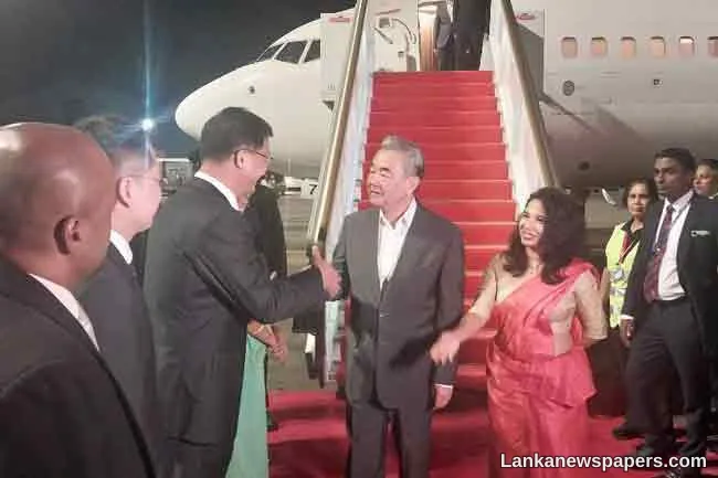 China s Foreign Minister arrives in Sri Lanka on transit visit