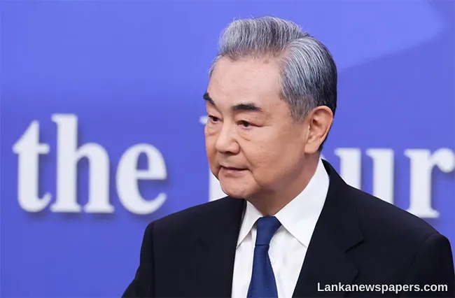 China s top diplomat urges Iran toward peace talks
