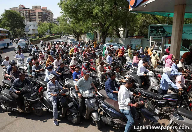 India cuts special excise duties on petrol, diesel