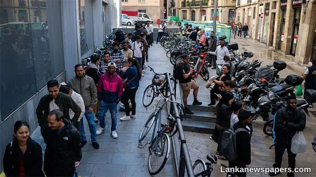 Spain starts program to legalize up to half-million migrants