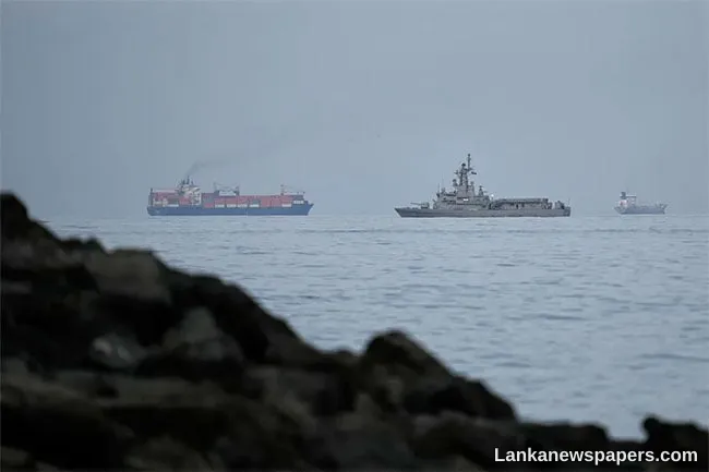 Three vessels hit by gunfire in Strait of Hormuz, crews safe