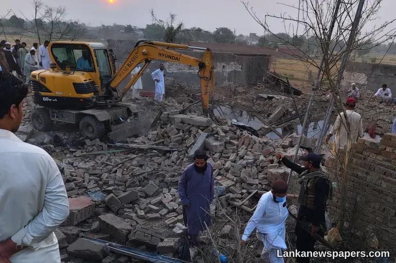 Car bomb attack and ambush in northwest Pakistan kill at least 21 police