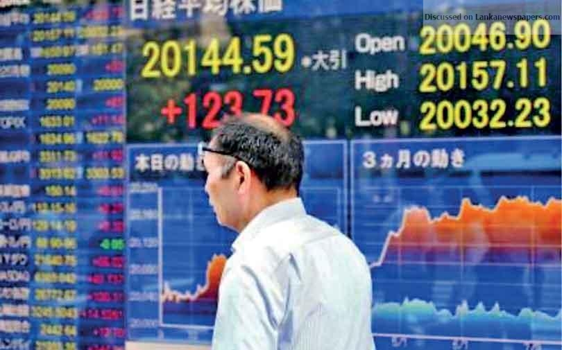 Asian markets mostly up as China, US hail trade talk’s progress