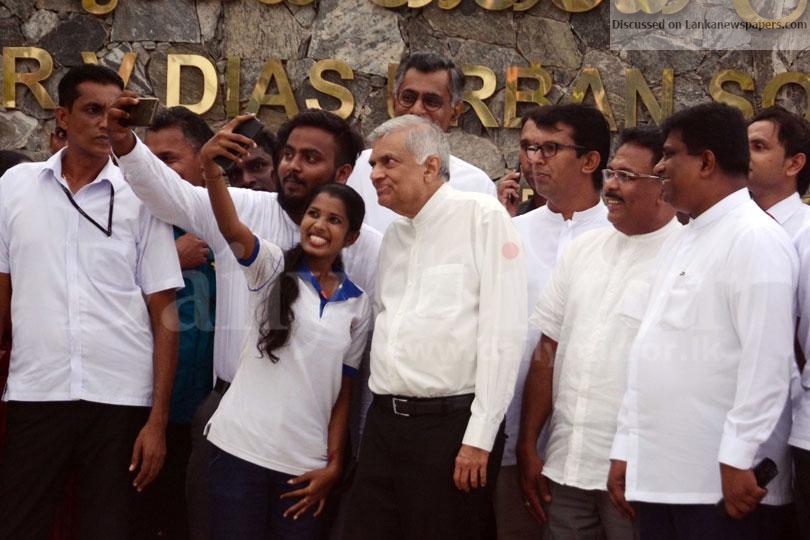 PM stuck in two selfies