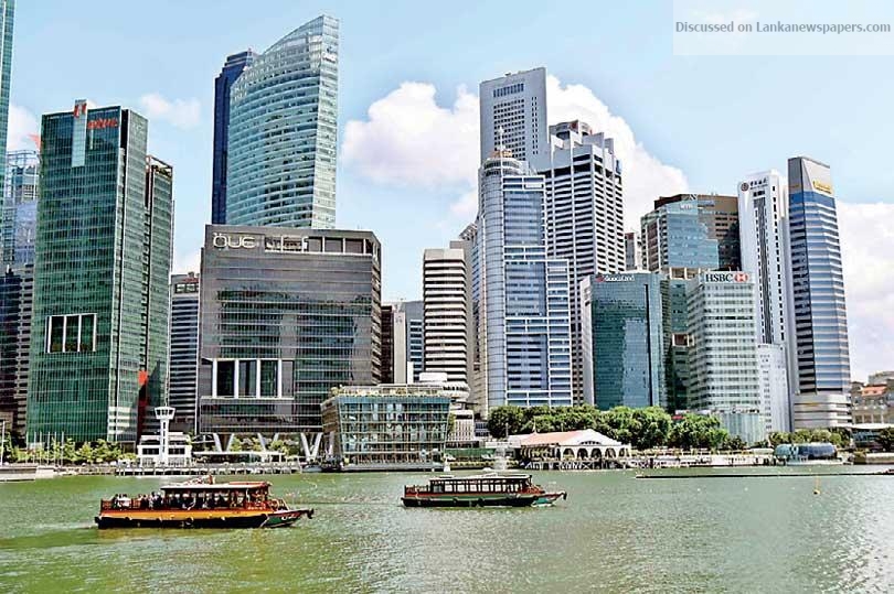 S’pore economy shrinks in warning for global trade
