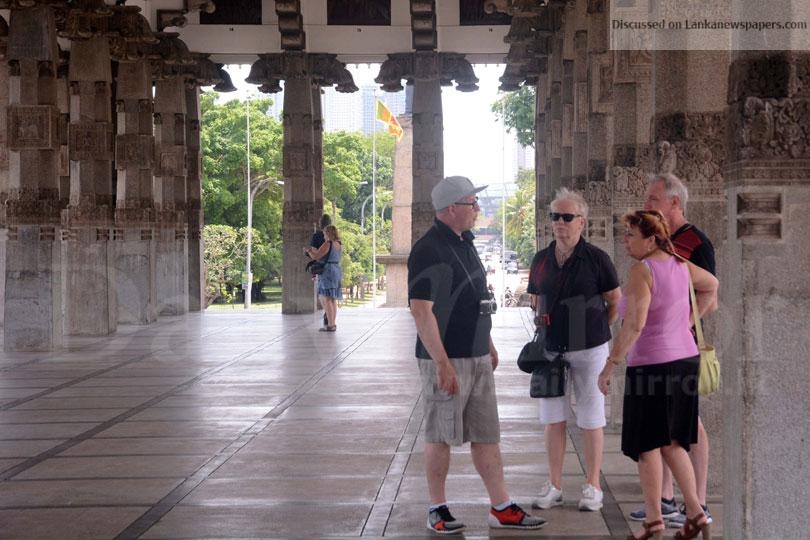 Tourists enjoy a walk