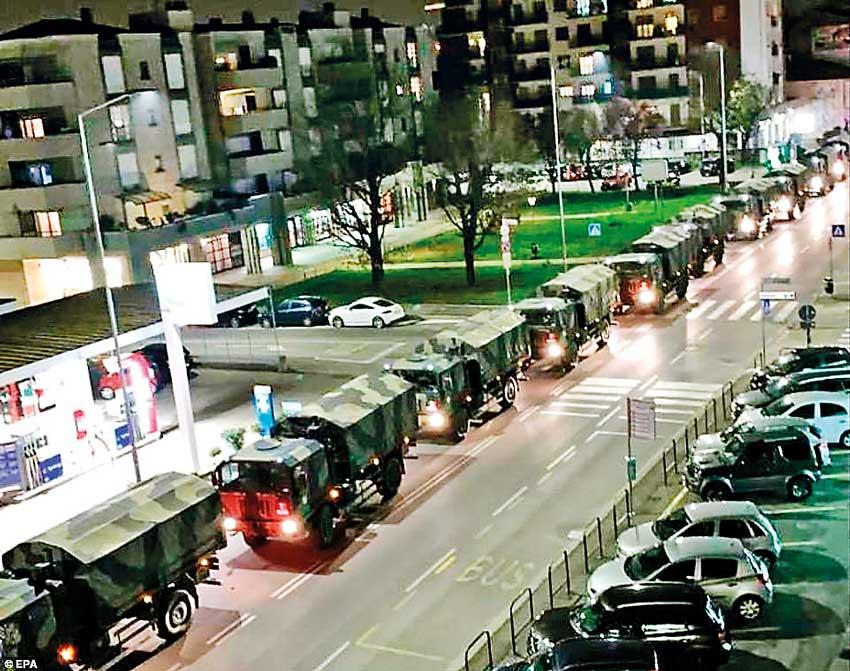 Military trucks transport coronavirus victims’ coffins to be cremated