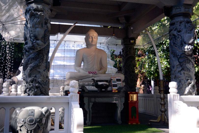 Oil anointing at Gangaramaya Temple