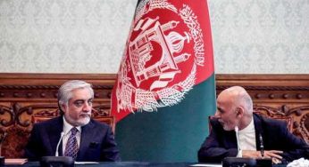 Afghan President Ghani and rival sign power-sharing deal